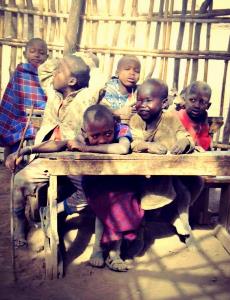 A_group_of_children_in_a_Masai_village_enjoying_one_of_their_lessons