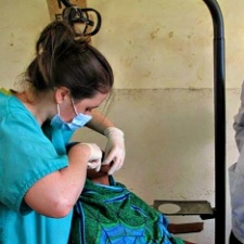 natalie_Bradley_carrying_out_an_extraction_on_a_patient_small